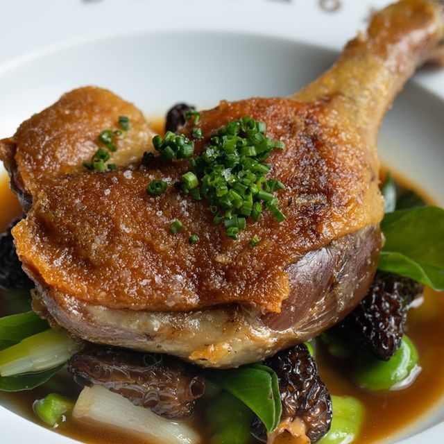 Confit de Canard | Crispy Duck Leg Confit with Fava Beans, Spring Onions, Morel Mushrooms & Duck Ju
